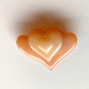 Vintage Peach-colored Bakelite Heart Pin